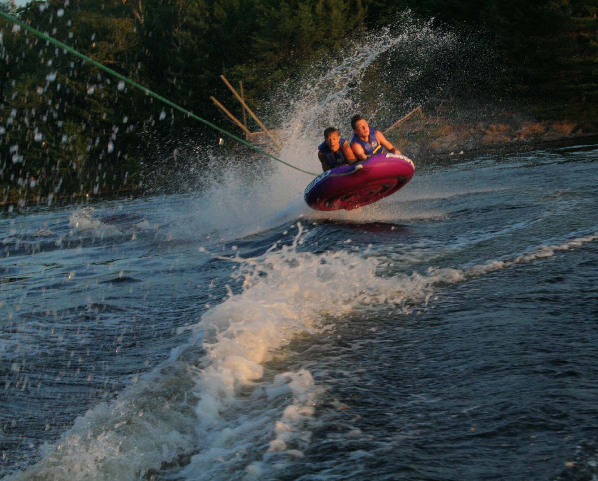 Kids tubing on Sugar Lake, at Camp ABK